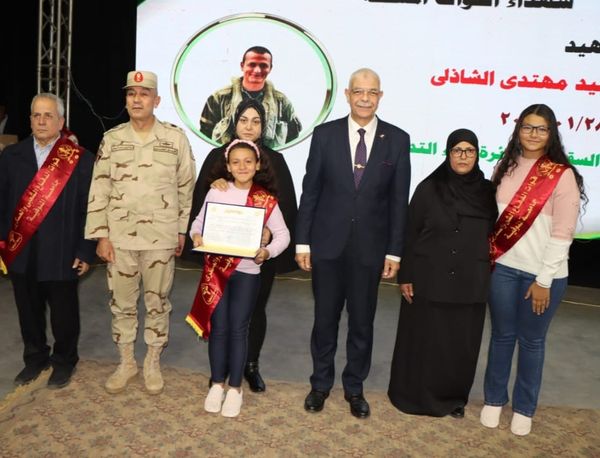 The President of Menoufia University and the Commander of the Popular and Military Defense Forces honor the families of the martyrs and the distinguished students of determination.