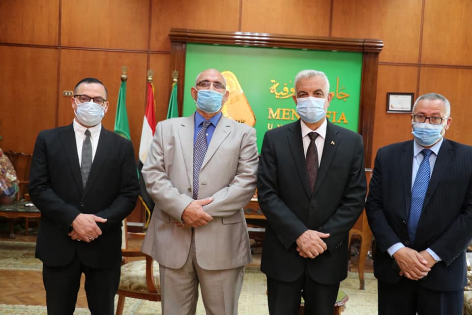 President of Menoufia University congratulates the new Dean of Faculty of Law.