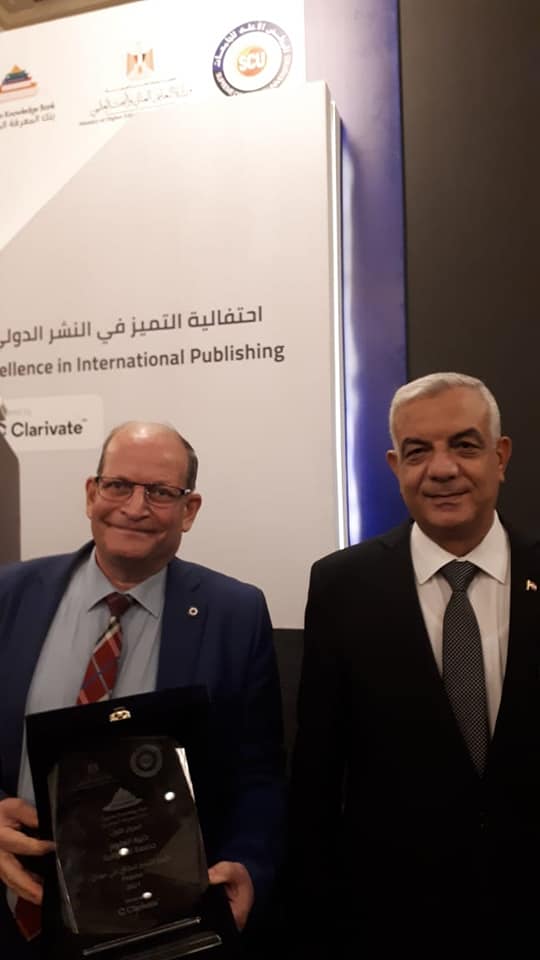 The Minister of Higher Education honors the Dean of Menoufia Sciences during the Celebration of Excellence in International Publishing